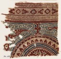 Textile fragment with part of a circle, petals, and tendrils