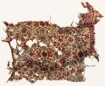 Textile fragment with flowers, leaves, and stars (EA1990.1068)
