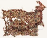 Textile fragment with flowers, leaves, and stars