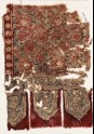 Textile fragment with circles, flowers, and tabs