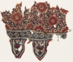 Textile fragment with medallions, interlace, and tabs