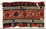 Textile fragment with crossed tendrils and rosettes