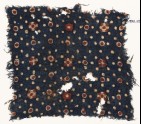 Textile fragment with dots and rosettes