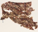 Textile fragment from a garment with parrots