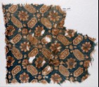 Textile fragment with lobed, elongated hexagons