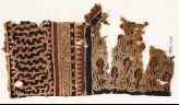 Textile fragment with plants and an interlacing vine (EA1990.1114)