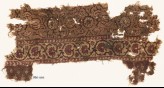 Textile fragment with flower-heads, tendrils, and vine