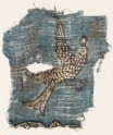 Textile fragment with flying bird