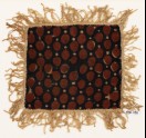 Textile fragment with dots and fringe, possibly from a place-mat or jar cover