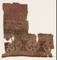 Textile fragment with flower bushes