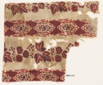 Textile fragment with linked ovals, leaves, and berries