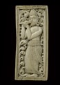 Ivory plaque with conch-blower (EA1990.1291)