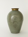 Greenware vase with floral decoration