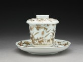 Lidded cup and saucer with quails, chrysanthemums, and millets