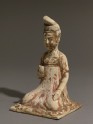 Seated figure of a lady holding a cup