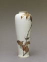 Satsuma style vase depicting a bird perched on a cherry tree