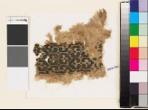 Textile fragment with pairs of palmettes and hexagons (EA1993.132)