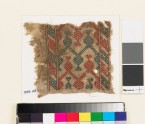 Textile fragment with hearts, V-shapes, and chevrons