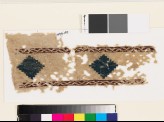 Textile fragment with stepped diamond-shapes and lattice