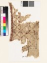 Textile fragment with grid of squares, rosettes, and leaves