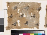 Textile fragment with stylized birds