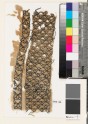 Textile fragment with diamond-shapes and triangles