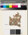 Textile fragment with rosettes and lattice of diamond-shapes (EA1993.218)