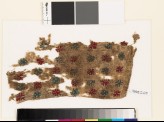 Textile fragment with stars and triangles