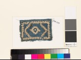 Textile fragment with diamond-shape, hexagon, rectangle, and linked crosses (EA1993.239)