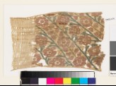 Textile fragment with flowers, buds, and leaves, probably from a sash or scarf