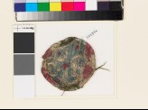 Roundel textile fragment with elaborate lobed cross