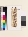 Textile fragment with stylized flower-shapes (EA1993.301)