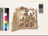 Textile fragment with stylized floral spray and chevrons (EA1993.310)