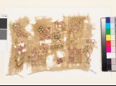 Sampler fragment with flowering plants, flower-heads, cloudband, rosette, and peacock (EA1993.319)