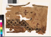 Textile fragment from the neck of a tunic with a V-shape, birds, and plants (EA1993.332)