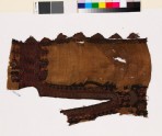 Textile fragment from the neck of a dress with stylized floral shapes