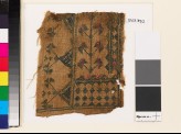 Textile fragment with stylized flowers, diamond-shapes, and triangles