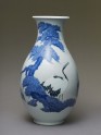 Inverted baluster vase with two cranes