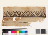 Textile fragment with stylized birds and trees
