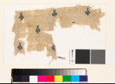 Textile fragment with diamond-shaped medallions and palmettes (EA1993.51)