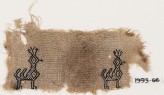 Textile fragment with two peacocks