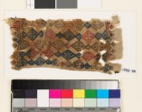 Textile fragment with linked diamond-shapes and palmettes, probably from a belt (EA1993.78)