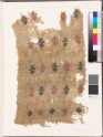 Textile fragment with stylized floral shapes and diamond-shapes (EA1993.85)