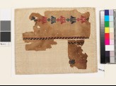 Two textile fragments with paired birds and diamond-shapes (EA1993.88)