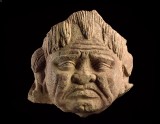 Head of a grimacing yaksha, or nature spirit