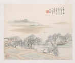 Figure walking alongside a river