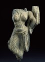 Fragment of a relief with female figure (EA1995.66)
