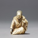Netsuke in the form of a Nō actor wearing a mask