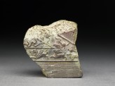 Fragment of a jeweller's mould with animals and birds in relief (EA1996.74)
