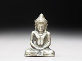 Silver amulet in the form of the Buddha